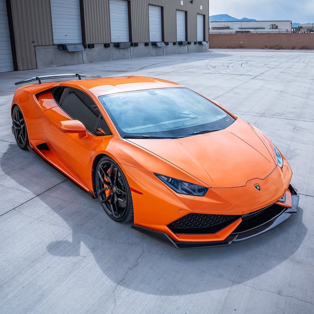 Huracan carbon kit and custom orange wing